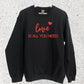 LOVE IS ALL YOU NEED SWEATSHIRT
